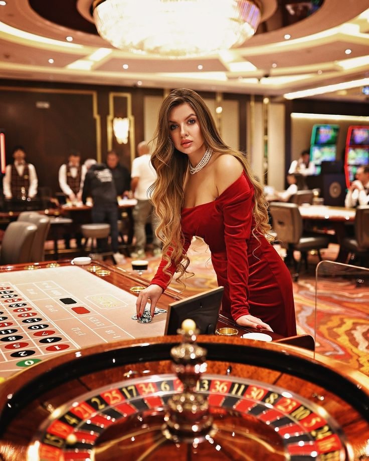 Tampilan antarmuka permainan Mega Moolah di platform hatori bet dengan gulungan dan tombol kontrol